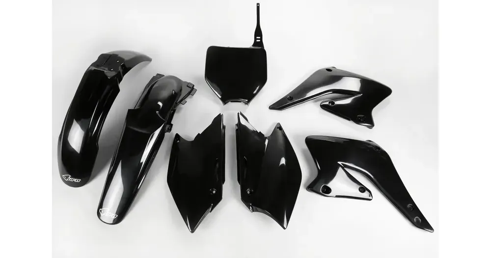 Pakollinen (Must-Have) Korisarjan suojasarja musta UFO Plast Suzuki RMZ 250 04-06