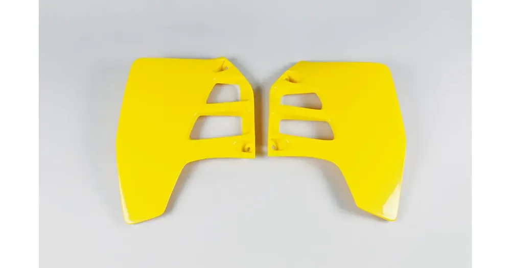 Keltaiset jäähdyttimen suojat UFO Plast Suzuki RM 125 / 250 89-92 Tehdashinta